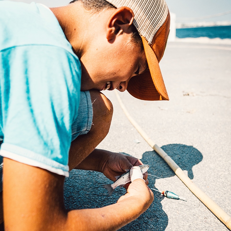 Ike Foundation | Boy Holding Fish